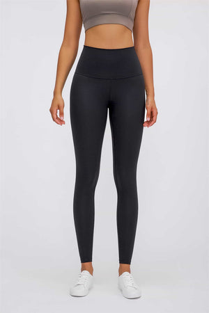 Black high rise leggings with a smooth finish and full length.