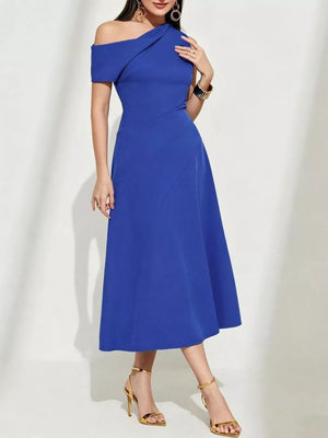 Blue asymmetrical midi dress with off-shoulder neckline and diagonal seam details.