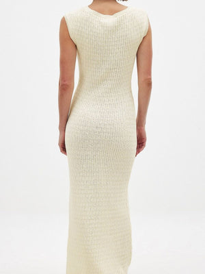 Scoop neck midi knit dress in apricot with a ribbed texture and sleeveless design.