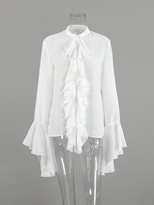 White ruffled flounce sleeve blouse with a high neckline and buttoned front.