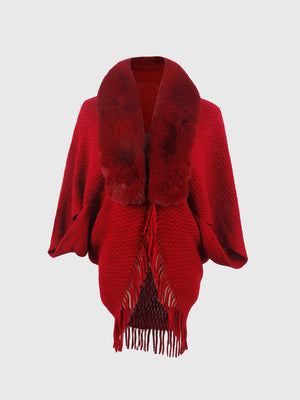 Deep Red textured knit poncho with faux fur collar and fringe detail