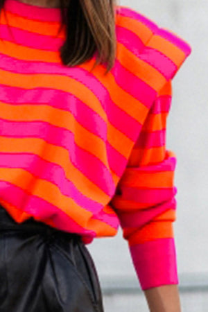 Bold shoulder stripe knit pullover in hot pink and orange.