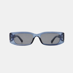 Chunky rectangular sunglasses in dusty blue with dark lenses and thick frames.
