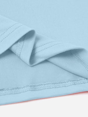 Light blue t-shirt detail showing hem and stitching.