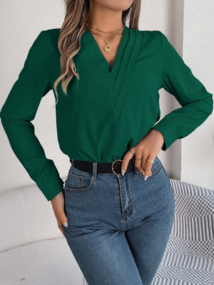 Dark Green V-neck blouse with pleated detail and long sleeves.
