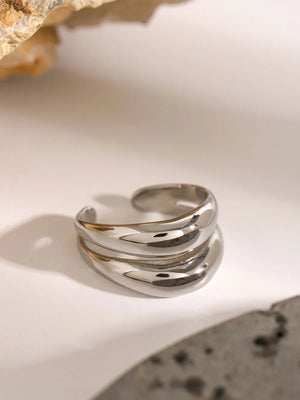 Silver double band open ring with a smooth, wavy design.