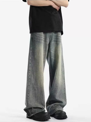 Men's relaxed fit vintage wash jeans in a baggy, casual style.
