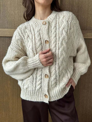 Ivory cable-knit button-down cardigan with round neckline and wooden buttons.