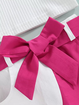 Baby girls' two-piece knit top and skirt set in rose red with a white ribbed top and a large bow detail.