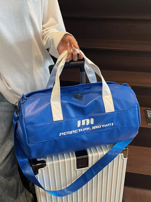 Blue pu leather sporty duffel bag with white handles and bold graphic text.