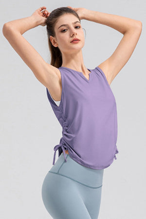 Lavender active tank top with notched neckline and adjustable side ruching.