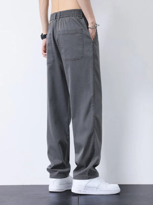 Relaxed fit gray cargo pants with elastic waist and back pocket detail.