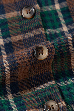Plaid snap jacket in brown, green, and navy with button detail.