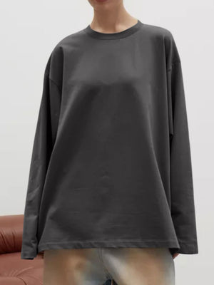 Oversized dark gray crewneck sweatshirt with voluminous long sleeves and a relaxed fit.