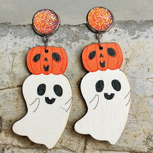 Spooky ghost and pumpkin dangle earrings with orange glitter studs.