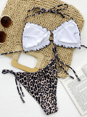 Leopard print bikini set with ruffled trim and tie sides.