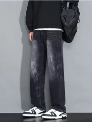 Men's dark wash loose-fit jeans with a faded effect.