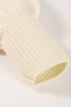 Cream knit sweater sleeve with ribbed cuff detail
