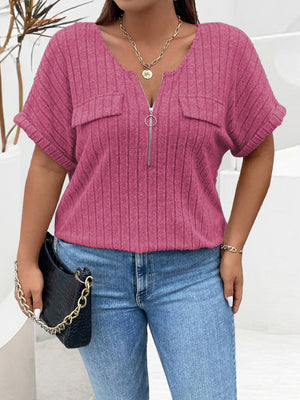 Cerise ribbed knit henley with short sleeves, zip neck, and chest pockets.