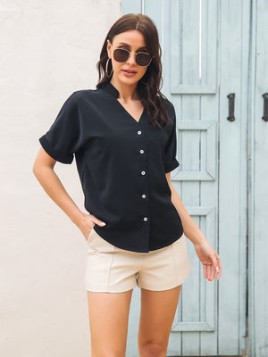 Black short sleeve buttoned blouse with a notch neckline.