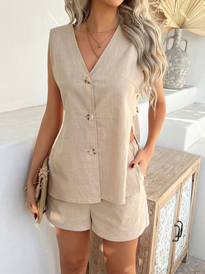 Tan linen vest with side slits and button front, paired with matching shorts.