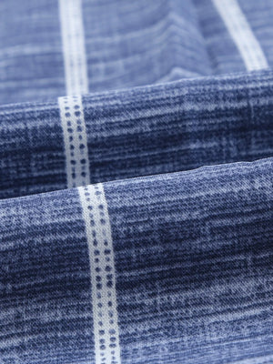 Dusty blue striped blouse with textured fabric detail
