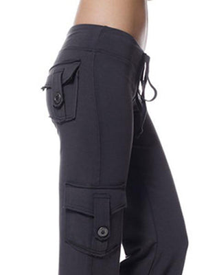Charcoal cargo-inspired wide-leg drawstring trousers with button-flap pockets.