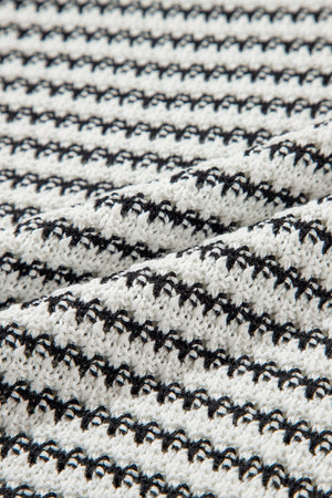 Sleeveless knit tank top in black and white stripes, acrylic fabric.