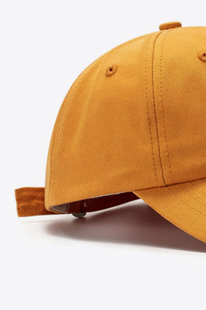 Orange cotton baseball cap with adjustable strap detail