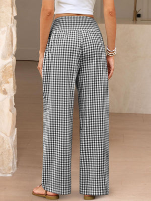 Smocked high-waist wide-leg pants in black and white gingham.