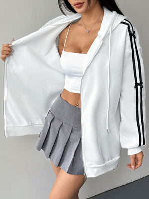 White zip-up hoodie with black stripes and bow details on sleeves.