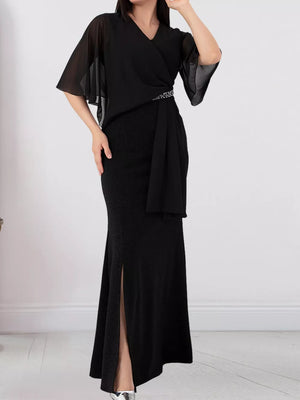 maxi dress in black featuring belted and sheath fit