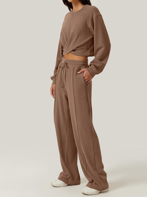 Brown knit lounge set with cross-front crop top and wide-leg pants