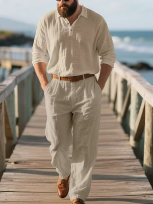 Men's light khaki linen blend long sleeve collared top and pants set.
