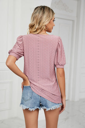 Pink eyelet puff sleeve scoop neck blouse with textured pattern