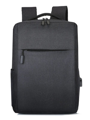 Black canvas school backpack with textured front and USB port.