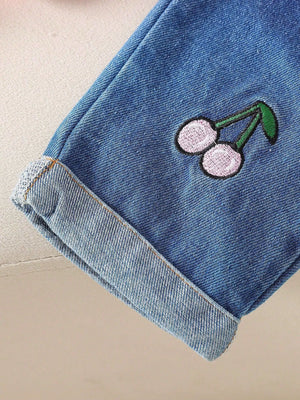 Baby denim set with embroidered cherries and cuffed hem.
