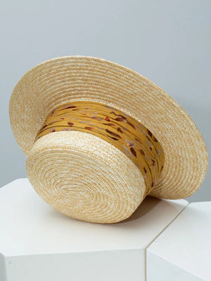 Wheat straw boater hat with ruched turmeric ribbon band.