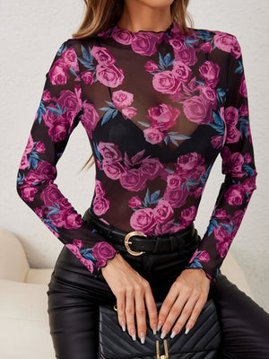 Floral mesh long sleeve top with lettuce trim neckline and cuffs.