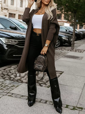Brown ribbed texture longline knit cardigan with open front and long sleeves.