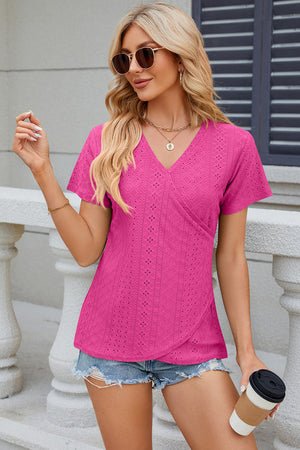 Hot Pink eyelet wrap v-neck top with short sleeves and a crossover front.