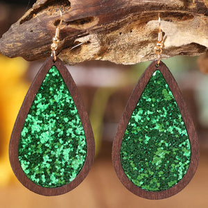 Green glitter teardrop earrings with wood frame and gold hooks