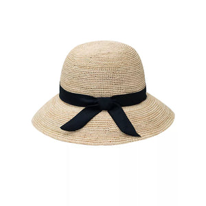 Chic wheat straw sun hat with black bow detail