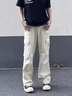 Men's beige relaxed fit cotton cargo pants with multiple pockets.