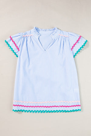 Light blue striped blouse with ruffled neckline and scalloped trim sleeves and hem.