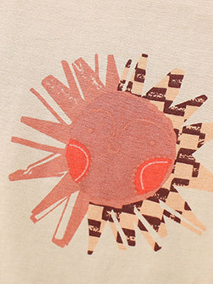 Toddler graphic tee with a pink sun graphic and checkered pattern detail.