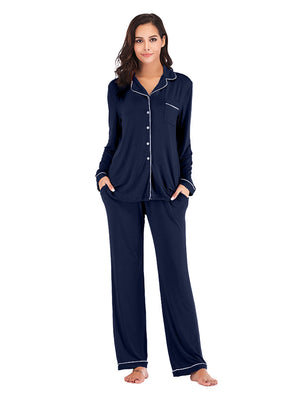Navy piped trim pajama set with long sleeves, button front, and pockets.