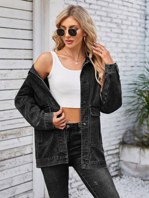 Black denim button-up jacket with chest pockets and a relaxed fit.