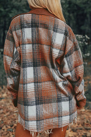 Colorblock plaid shacket in brown with ribbed texture and frayed hem.