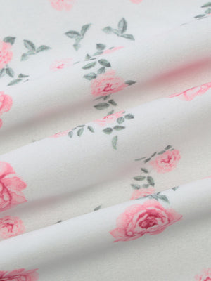 White midi dress fabric with pink rose print and spaghetti straps detail